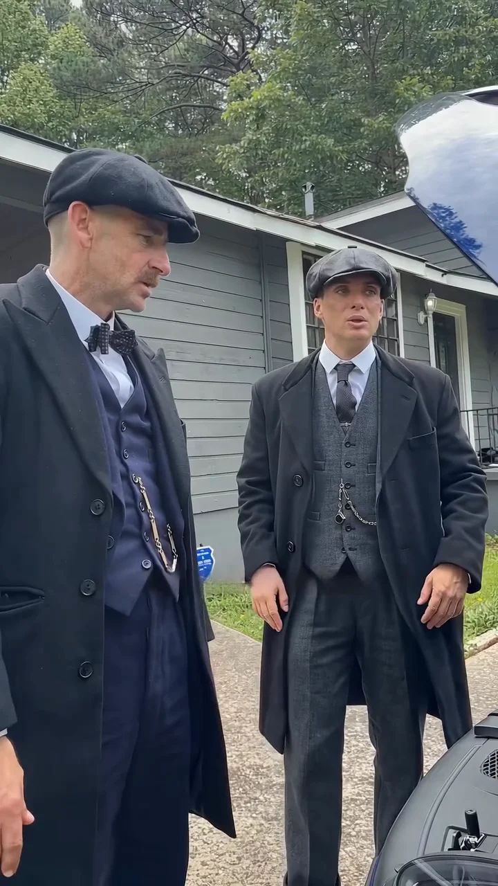 Grey-suit character in the Car Repair source video