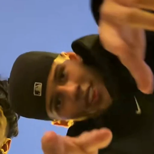 Black cap in the Mi Chico Dance source video