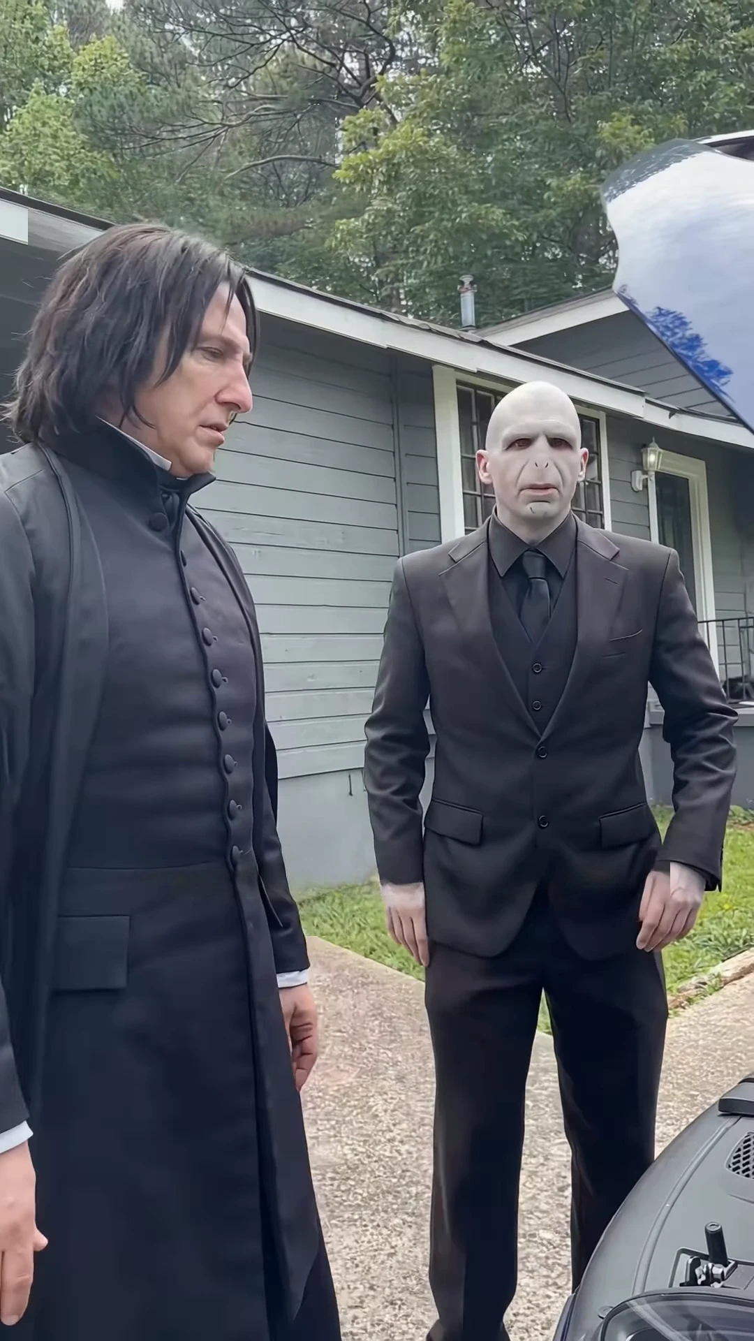 Suit character in the Voldemort Car Repair source video
